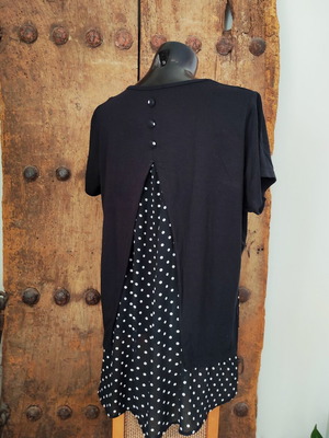 Women's black T-shirt with polka dot chiffon open back and button detail