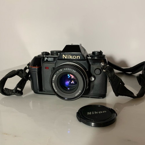 Nikon F-301 with nikkor 50mm 1:1.8 lens and HoyaHMC filter like new