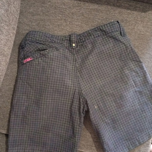 O'Neill women's shorts used, size 28, colorful checkered pattern