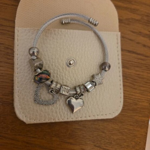 Earrings, bracelet and necklace used, silver color