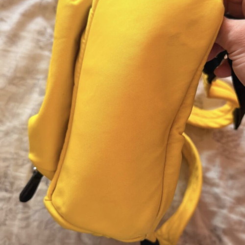 Versace backpack like new with leather details yellow