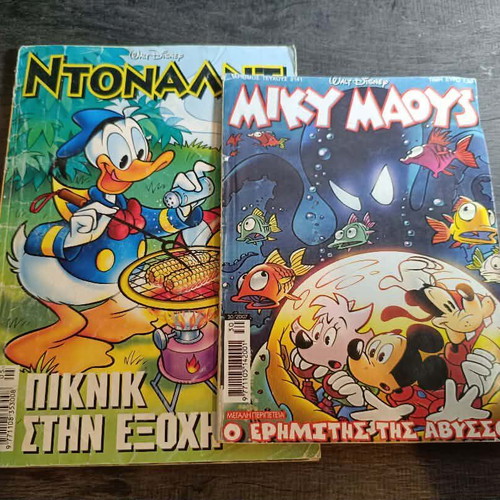 Mickey Mouse and Donald Duck comic used with cover wear