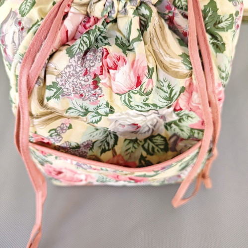 Vintage fabric drawstring bag with floral pattern
