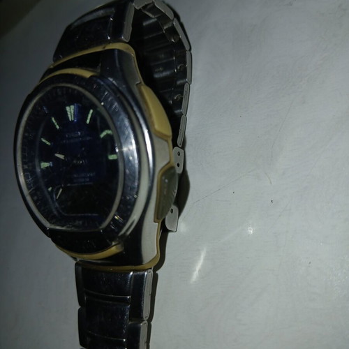 Casio Illuminator wristwatch used, blue and silver, solar battery