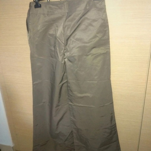 Shiny bell-bottom pants new, size Large, green and gold