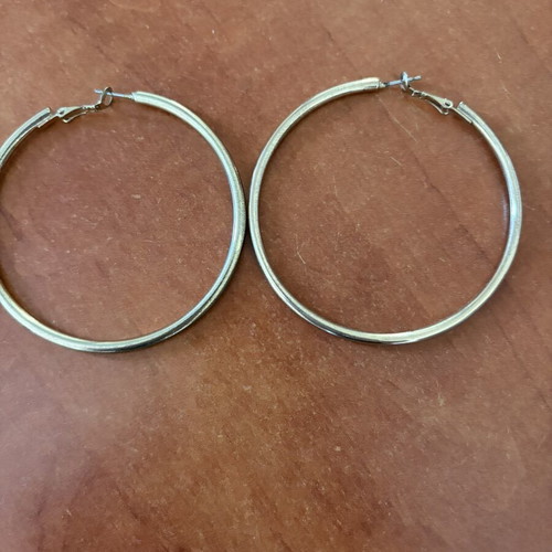 Gold color faux earrings used, slightly faded