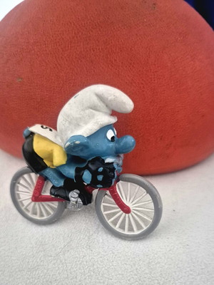 Smurf on Bicycle figure used, 1980s German vintage toy