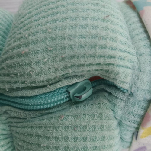 Light-up Huggy toy from the 1990s, fabric stains