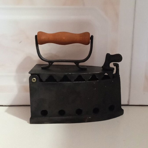 Small charcoal iron decorative like new made in Greece