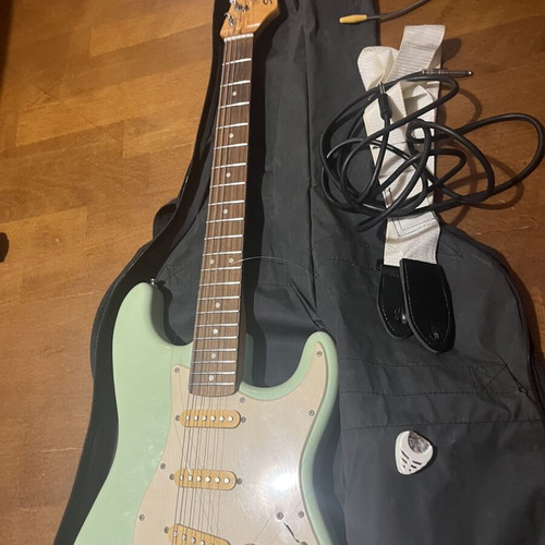 Squier by Fender Bullet Stratocaster electric guitar, Surf Green, 2009