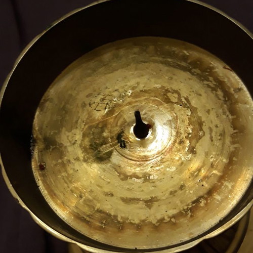 Solid brass candlestick with beeswax candle used