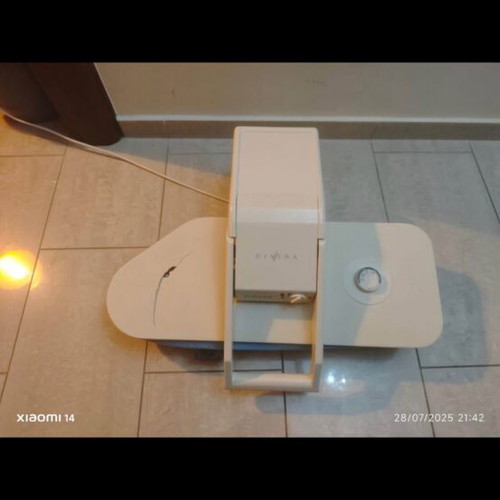 Singer pressing machine used with fabric damage