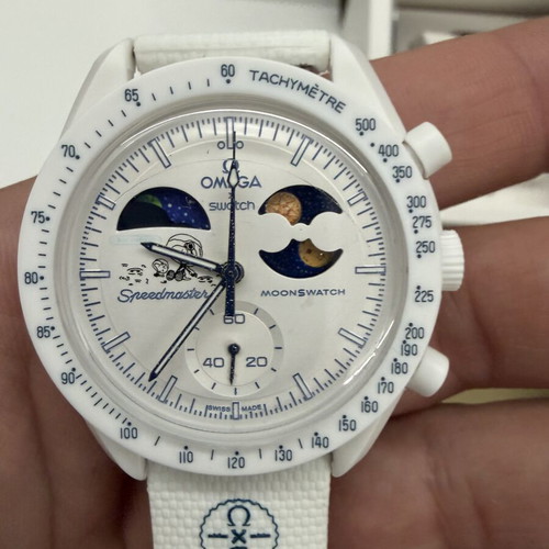Swatch Omega Mission to Earthphase Moonshine Gold watch, white