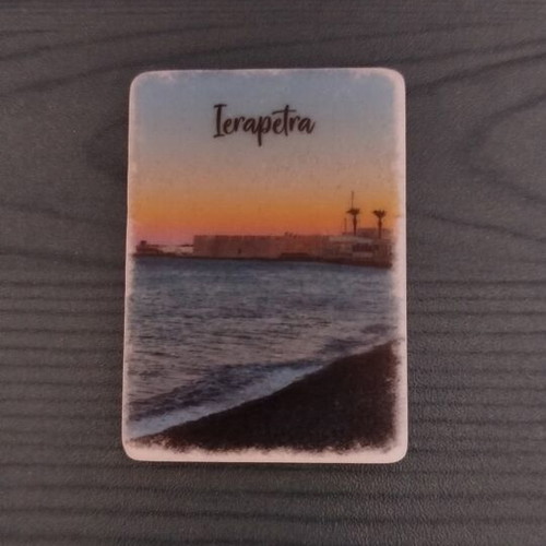 Set of 12 souvenir fridge magnets from various regions