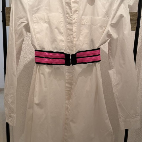 Set of 3 pieces like new, white semize shirt with letters, green skirt, fuchsia belt