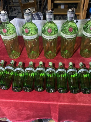 Tanqueray gin bottles used, 5 promotional with sockets and 12 regular with hooks