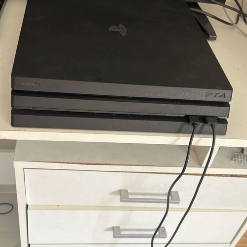PlayStation 4 Pro like new with two controllers, 1TB storage