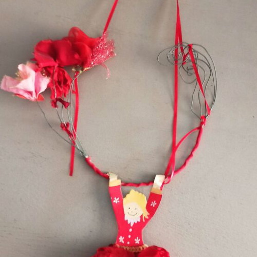 Handmade hanging decorative figure with fabric flowers like new