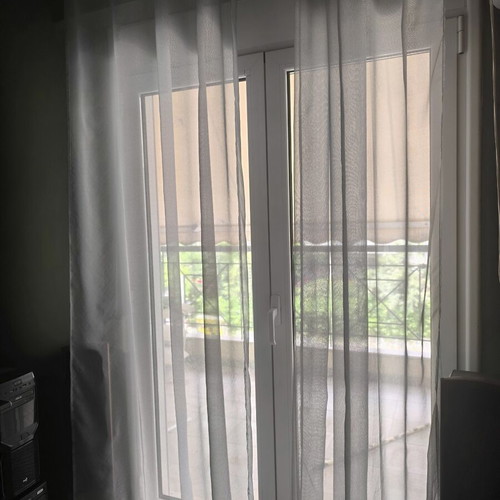 Turquoise curtain set like new, two pieces