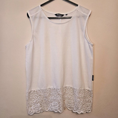White Sleeveless Blouse