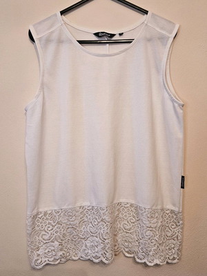White Sleeveless Blouse