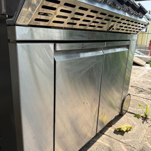 Napoleon Prestige Pro 665 gas grill used with hood and rotisserie