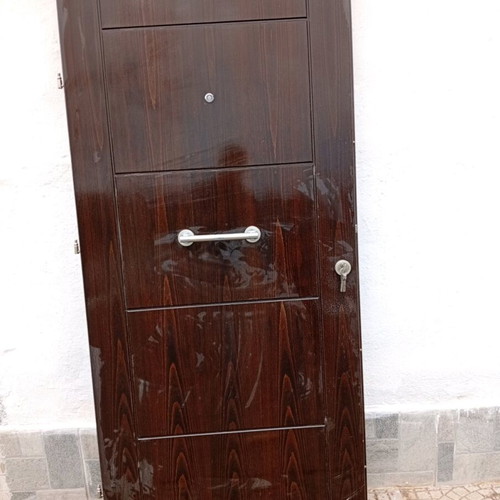 Entrance door used 2.15x0.94 solid wood with security lock