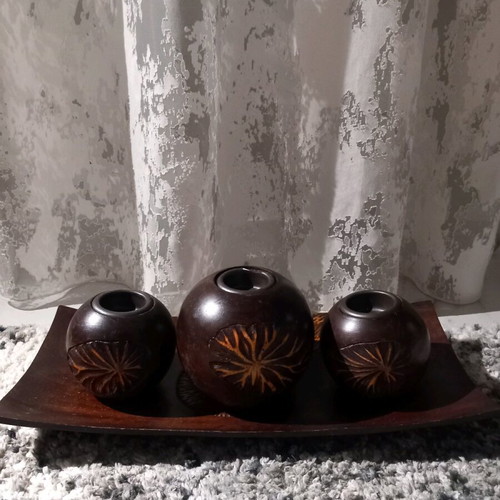 Plate with three wooden candlesticks used