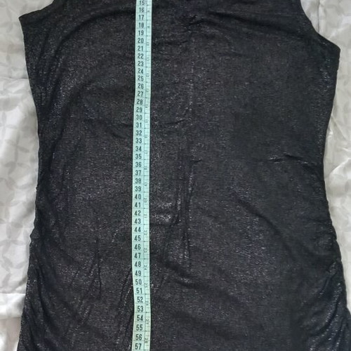 Sleeveless top, shiny elastic fabric. Size M/L