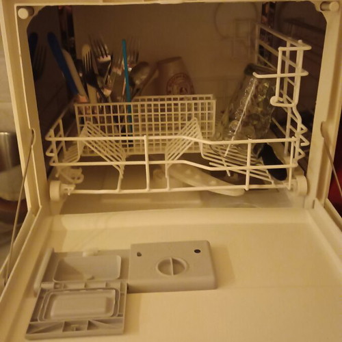 Carad countertop dishwasher used, functional with loose button