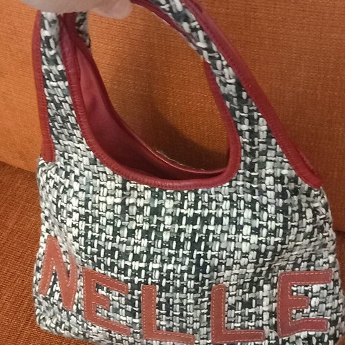 Coccinelle knitted shoulder bag like new with leather details