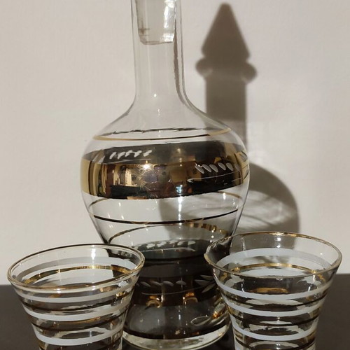 Vintage glass decanter set with 2 glasses used, gold decorations