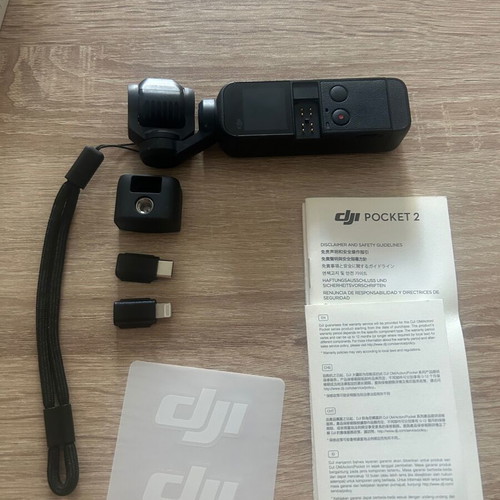 DJI Pocket 2 4K Vlogging Camera like new with accessories and ring light