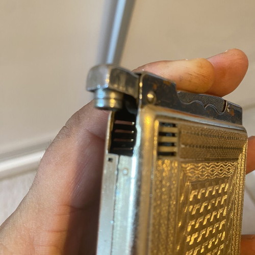 Tobacco case with petrol lighter used