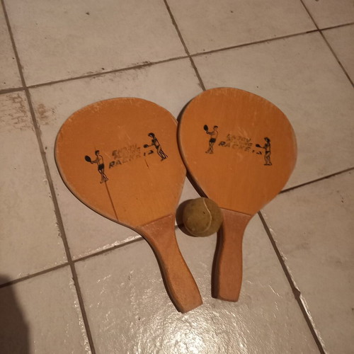 Wooden beach rackets used, pair with ball