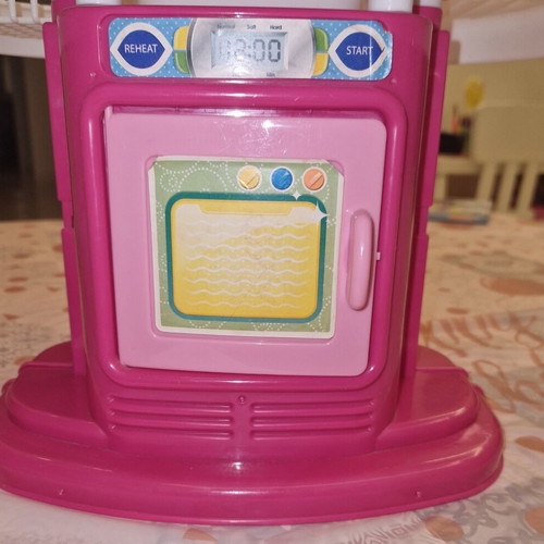Children's kitchen playset like new with pot, knife, and fork