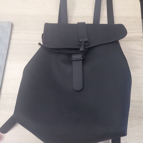 Rains backpack like new, black color