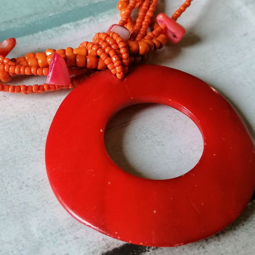 Necklace new with orange shell and beads