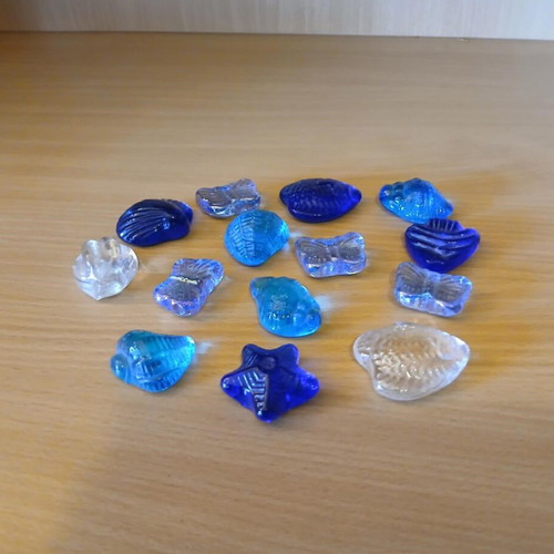 Glass decorative items used, set of 14, shells and stars