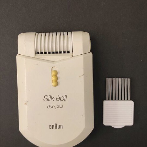 Silk epil duo plus Braun epilator used with charger and cleaning brush