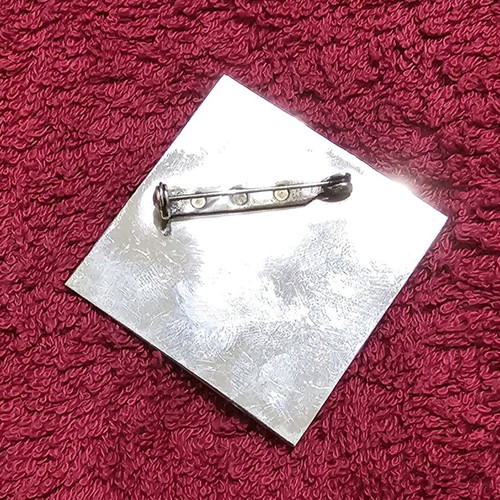 Silver-plated pin replica of Amyklai seal