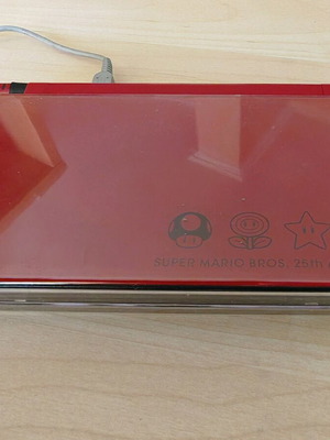 Nintendo DSi XL Mario 25th Anniversary Edition console used, 4GB SD