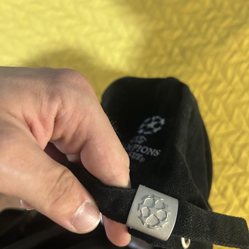 AEK Champions League hat used, adjustable, black and yellow