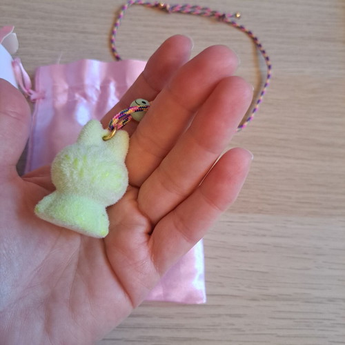 Labunoma necklace with colorful fuzzy smiling monster charm, like new
