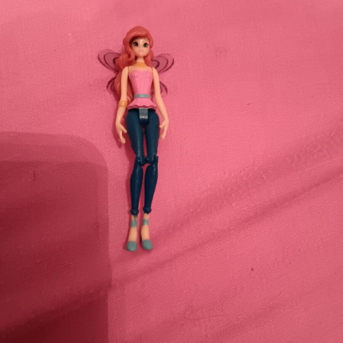 Doll like new with gift bracelet