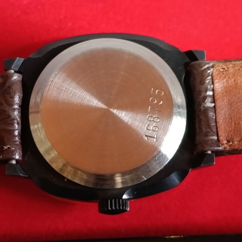 Pobeda vintage Soviet Russian mechanical watch with square case and double-headed eagle emblem