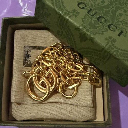 Gucci gold necklace with large GG pendant and chain, new