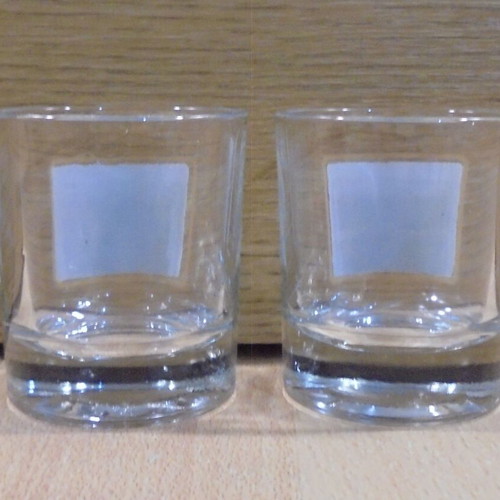 Karelia Ultra cigarettes set of two used promotional shot glasses