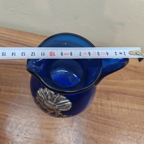 Set of blue blown glass jug and silver-plated fondue pot like new