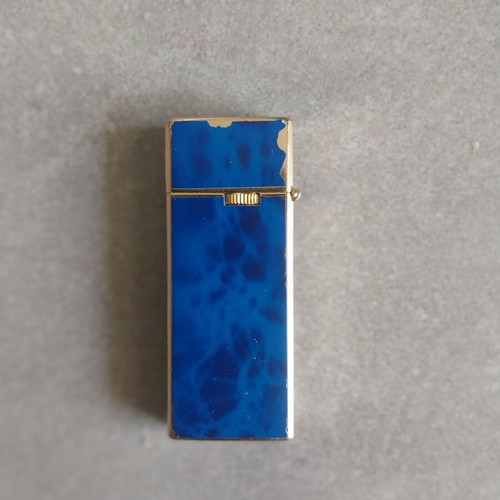 Sharp vintage lighter used with imperfections